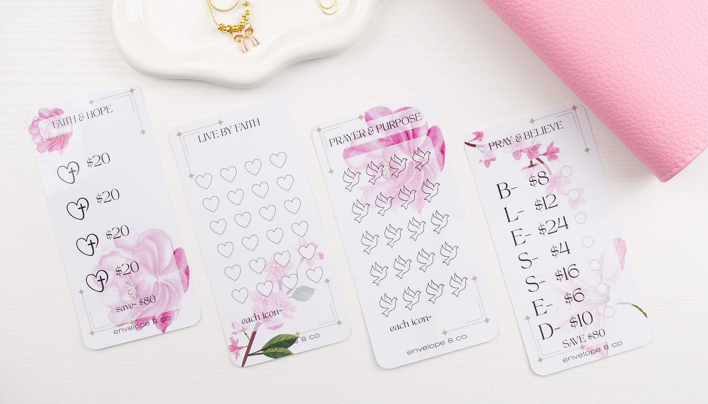 Set of savings challenges with floral and prayer designs on a white surface.