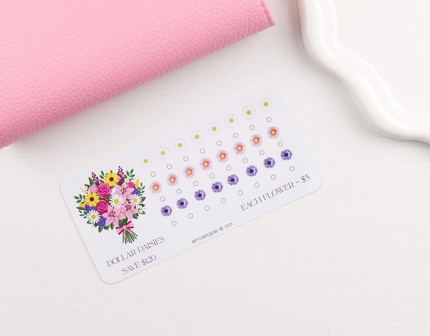 Flower-themed savings challenge with colorful illustrations on a white surface.