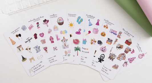Holiday savings challenge bundle featuring eight seasonal inserts fanned out: New Year's, Valentine's Day, Easter, Summer, Birthday, Halloween, Thanksgiving, and Christmas, each with themed icons and $100-$110 goals