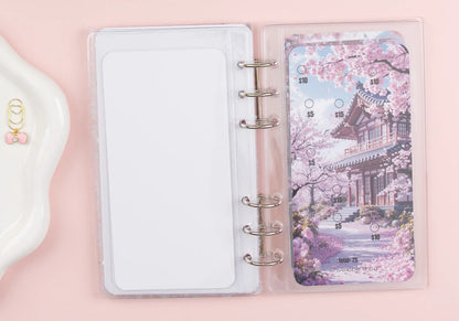 Acrylic binder with cherry blossom design on a pink background