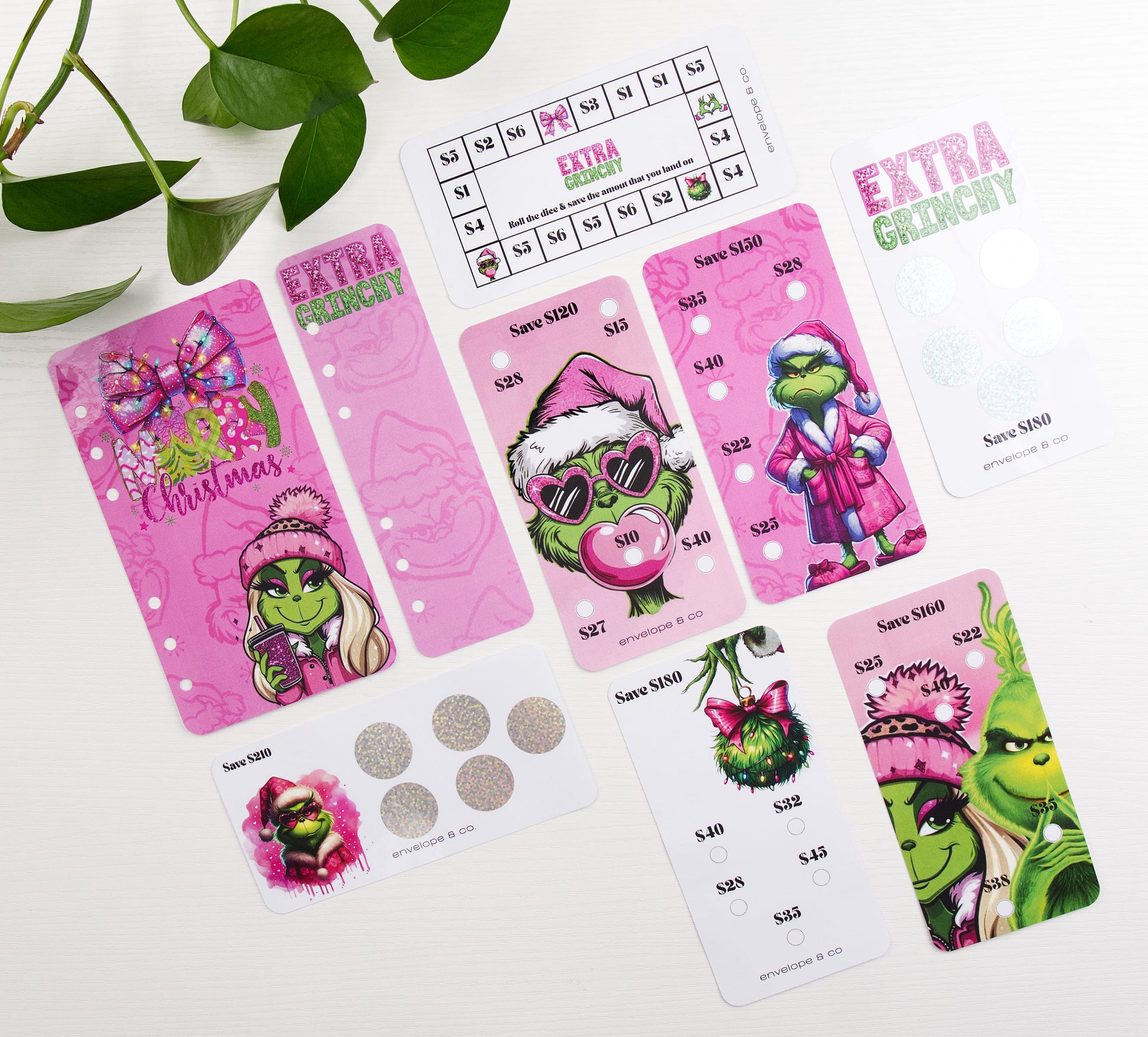 Set of pink savings challenges with green character-themed designs on a white background.