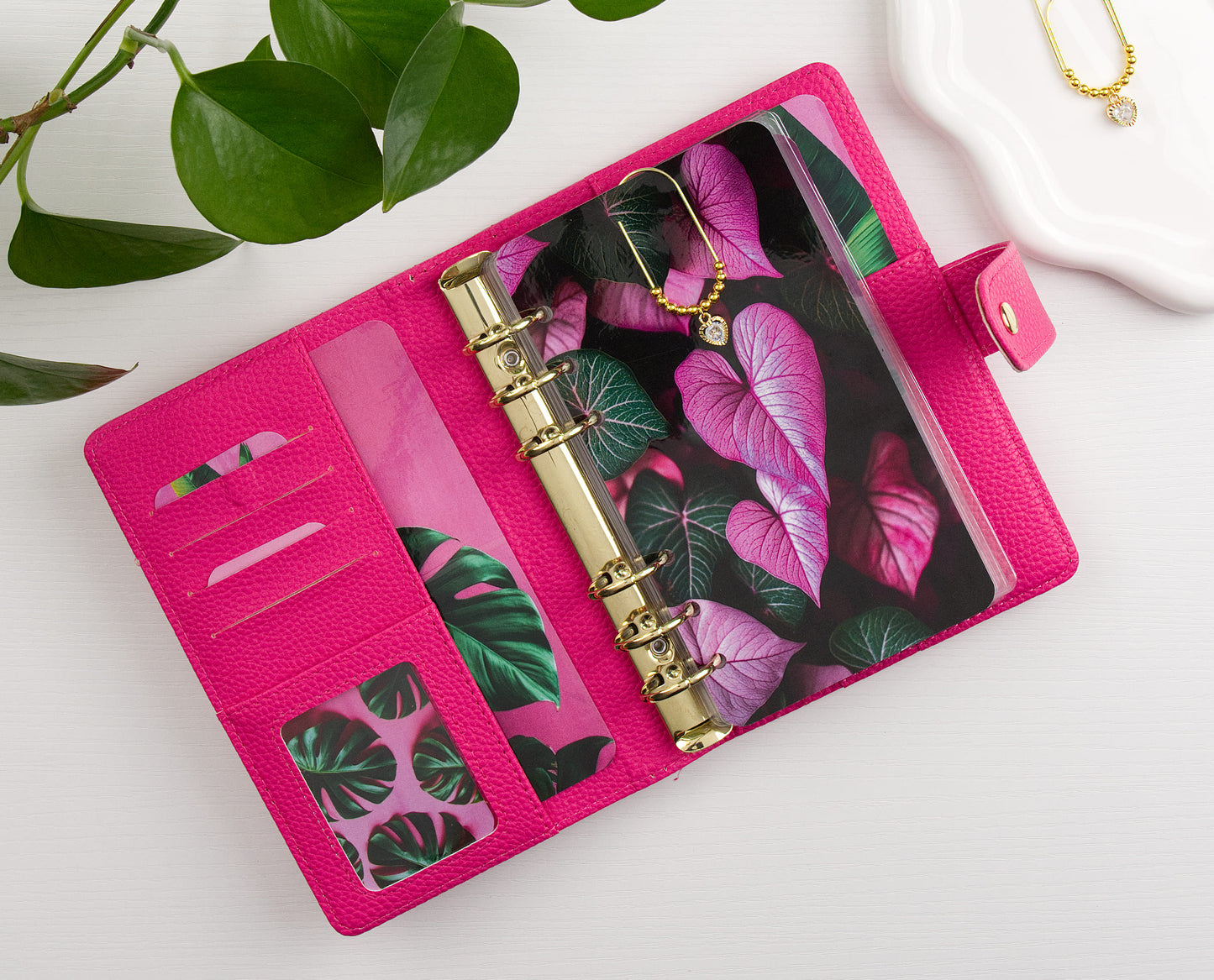 Pink binder with floral design dashboard and binder decor with crystal heart binder charm attached to dashboard